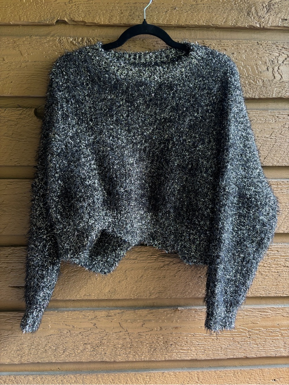 Cozy Black Glitter Crewneck Sweater with scalloped hem